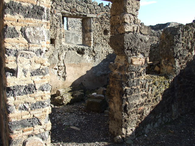 I.9.8 Pompeii. December 2006. Looking west into tablinum in north-west corner of atrium.