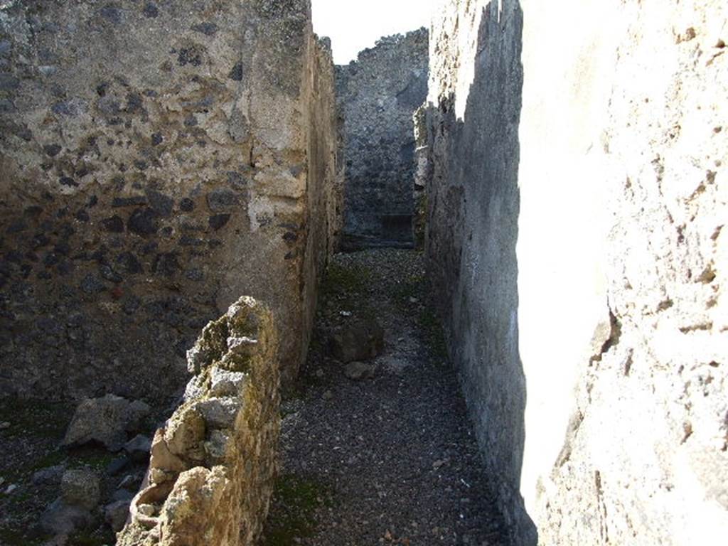 I.9.8 Pompeii. December 2006. Looking west along corridor to rear rooms. .