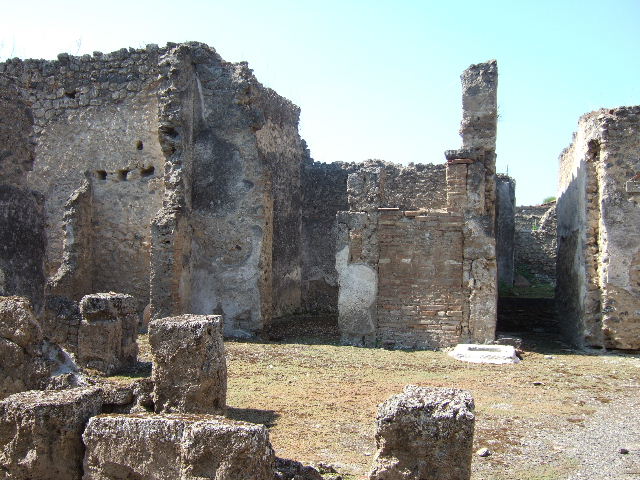 I.9.10 Pompeii. December 2006. Looking west across garden, from site of east portico.   

 

