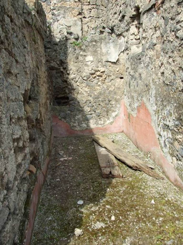I.9.12 Pompeii. March 2009. Room 9. North side of room with remains of plaster .