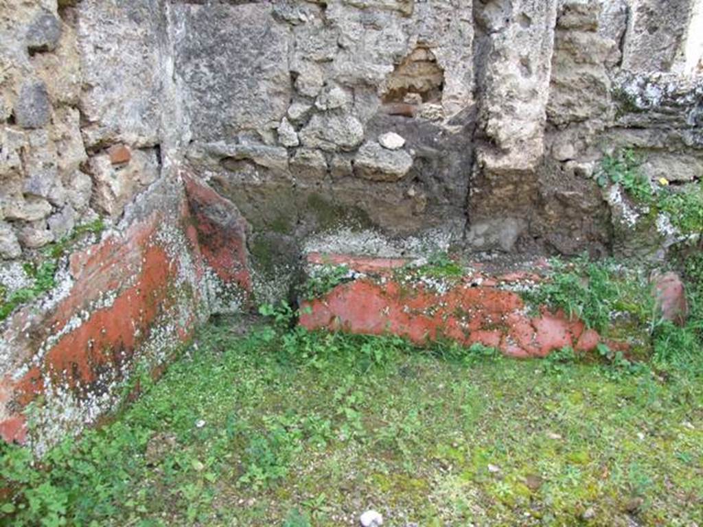 I.9.12 Pompeii. March 2009. Room 9. South west corner with remains of painted plaster.