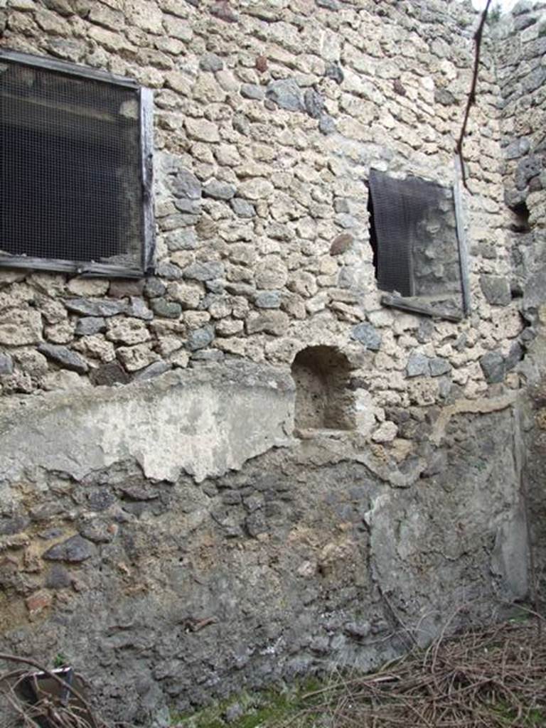 I.9.14 Pompeii. March 2009. Room 4. North wall with niche and windows.