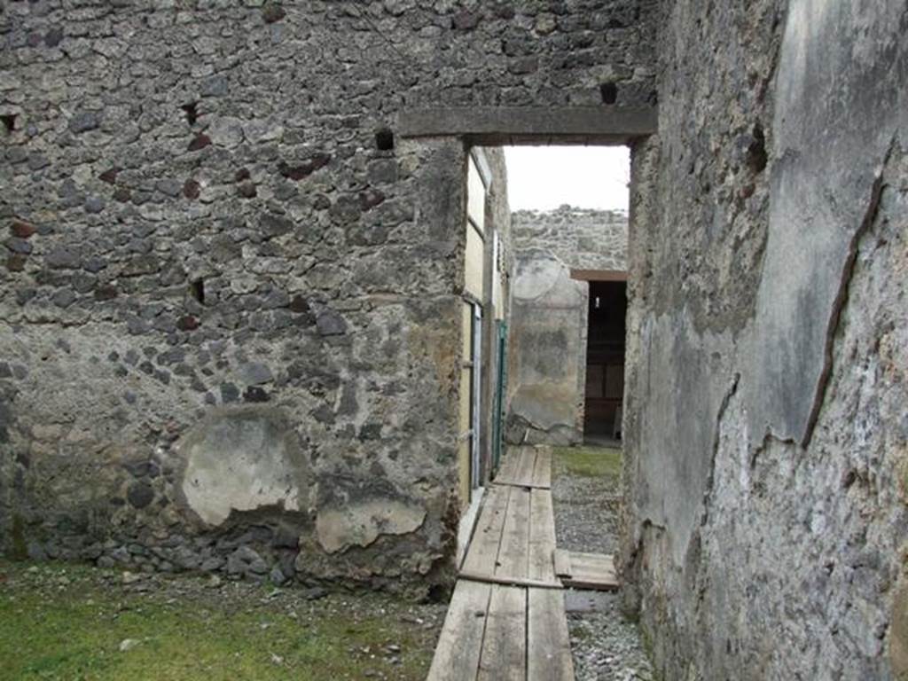 I.9.14 Pompeii. March 2009. Room 5. South wall, with continuation of corridor towards atrium.