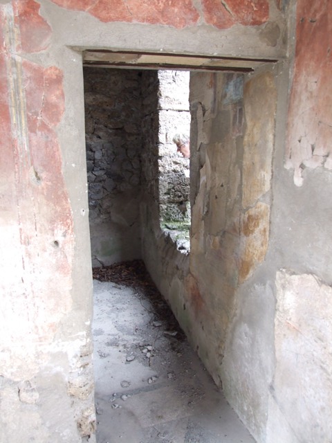 I.9.14 Pompeii. March 2009.  Room 6. Tablinum floor with diamond pattern mosaic in doorway floor leading to Room 7.