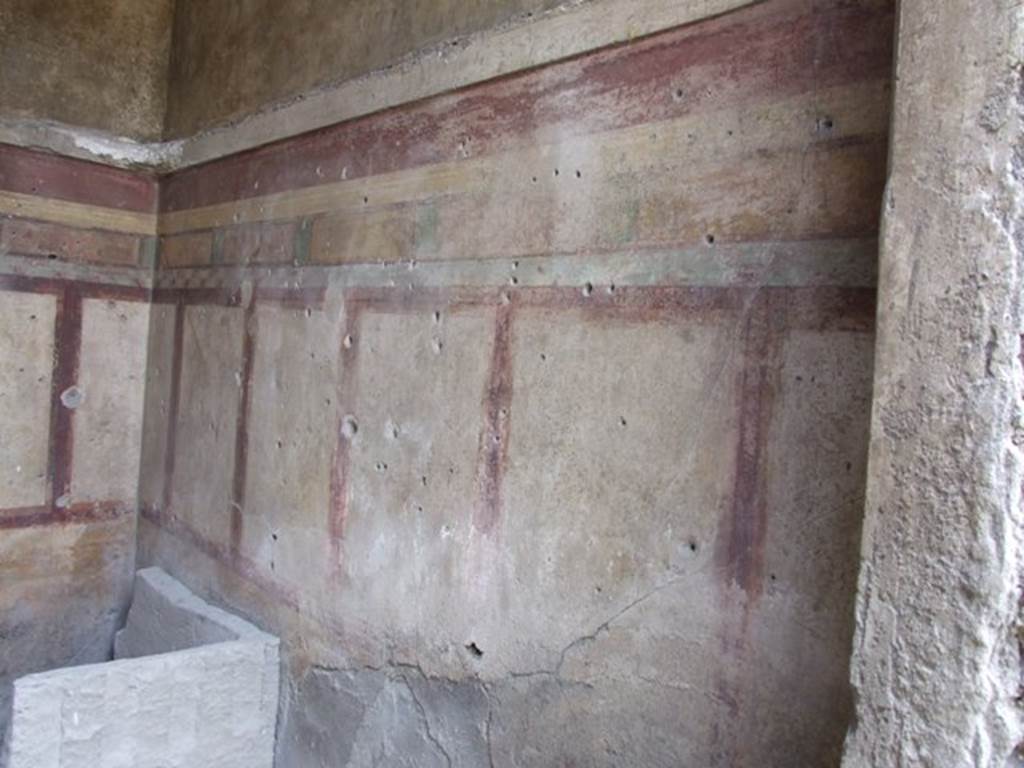 I.9.14 Pompeii. March 2009. Room 13. West wall, and remains of plaster cast of furniture.