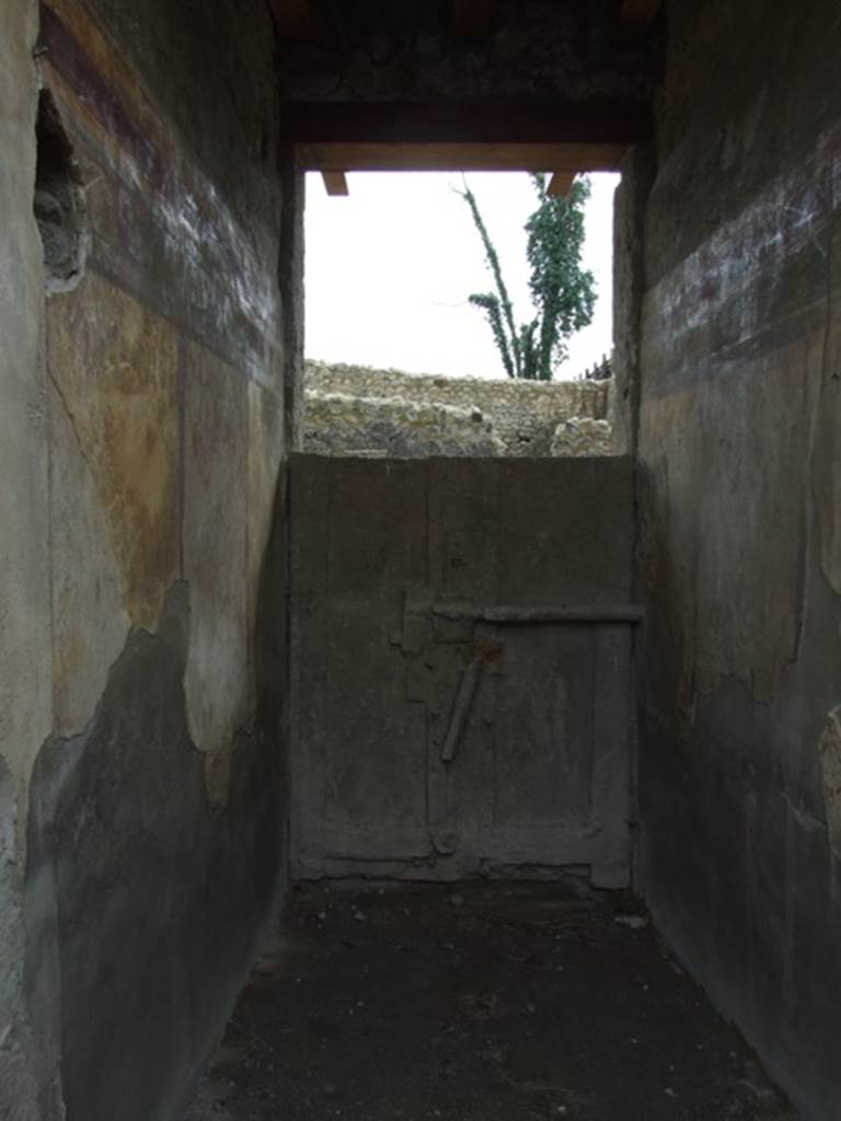I.9.14 Pompeii. March 2009. Room 14. Plaster cast of rear of blocked door (of I.9.13).