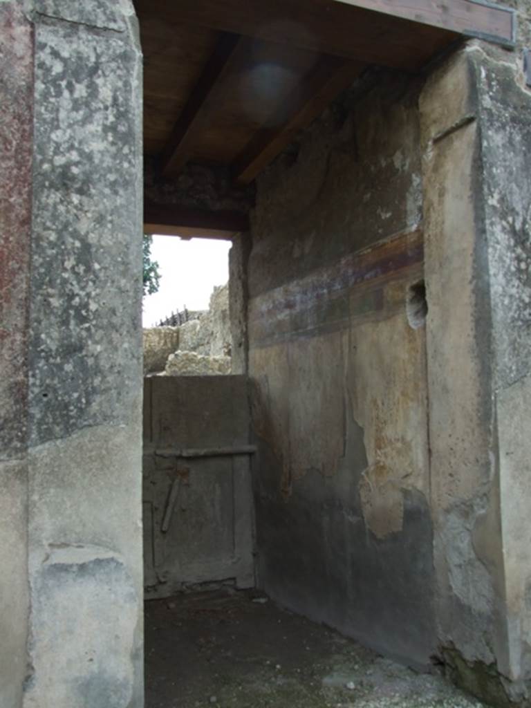 I.9.14 Pompeii. March 2009. Room 14. West wall of fauces, and plaster cast of inside of front door to I.9.13