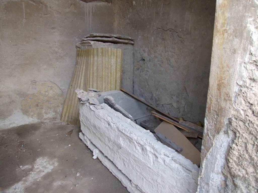 I.9.14 Pompeii. March 2009. Room 15. Plaster cast of furniture against west wall.