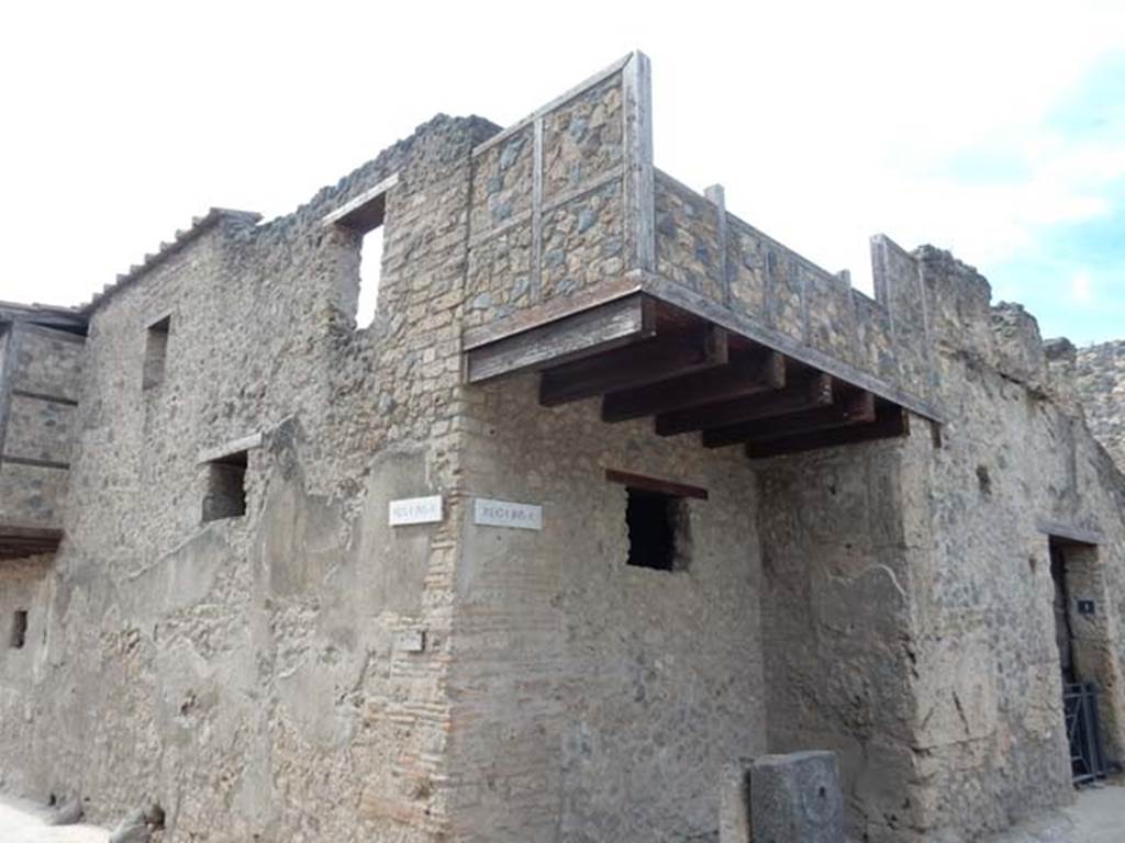 I.10.1 Pompeii, on right. May 2017. Looking south-west towards upper floor, with reconstructed balcony. Photo courtesy of Buzz Ferebee.