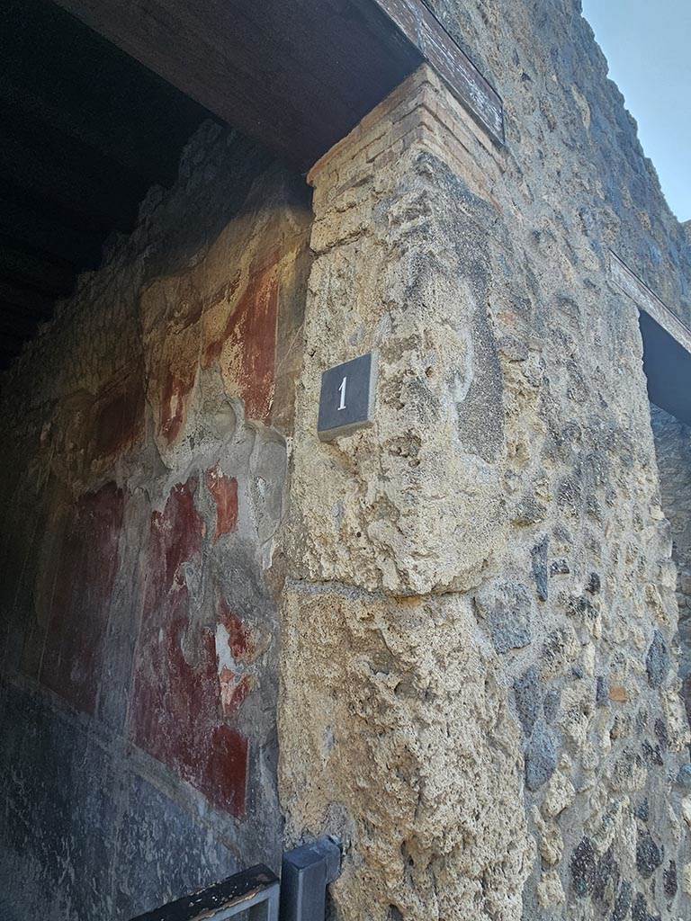 I.10.1, Pompeii. November 2024.
West side of entrance doorway with identification number-plate. Photo courtesy of Annette Haug.