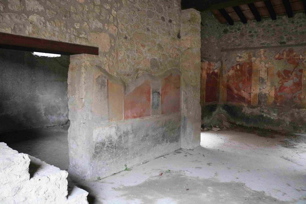 I.10.1 Pompeii. December 2018.
Looking towards east wall of atrium with doorway to oecus and steps to upper floor, on left. On the right would be a doorway to a cubiculum.
Photo courtesy of Aude Durand.