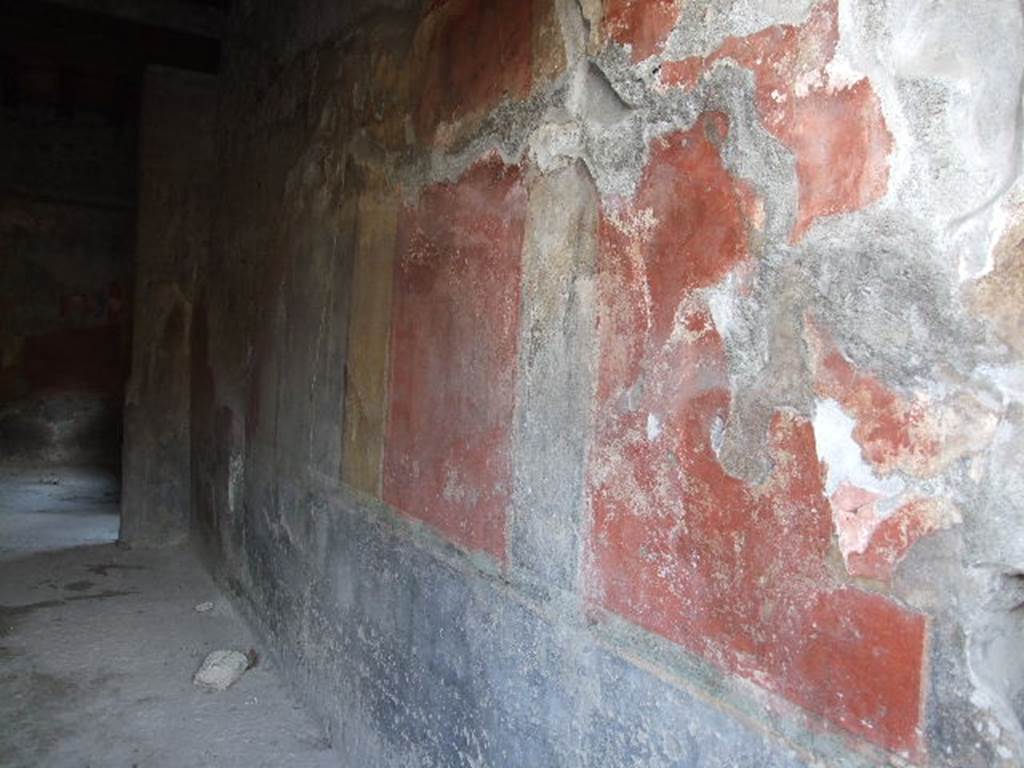 I.10.1 Pompeii. December 2006. West wall of atrium. On the left of the photo, is the area of the room numbered as 5 in Notizie degli Scavi, the uncovered courtyard, kitchen and latrine, see below.