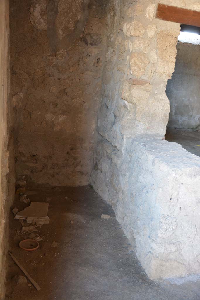 I.10.1 Pompeii. April 2017. Looking east from entrance doorway, into latrine.
Photo courtesy Adrian Hielscher.