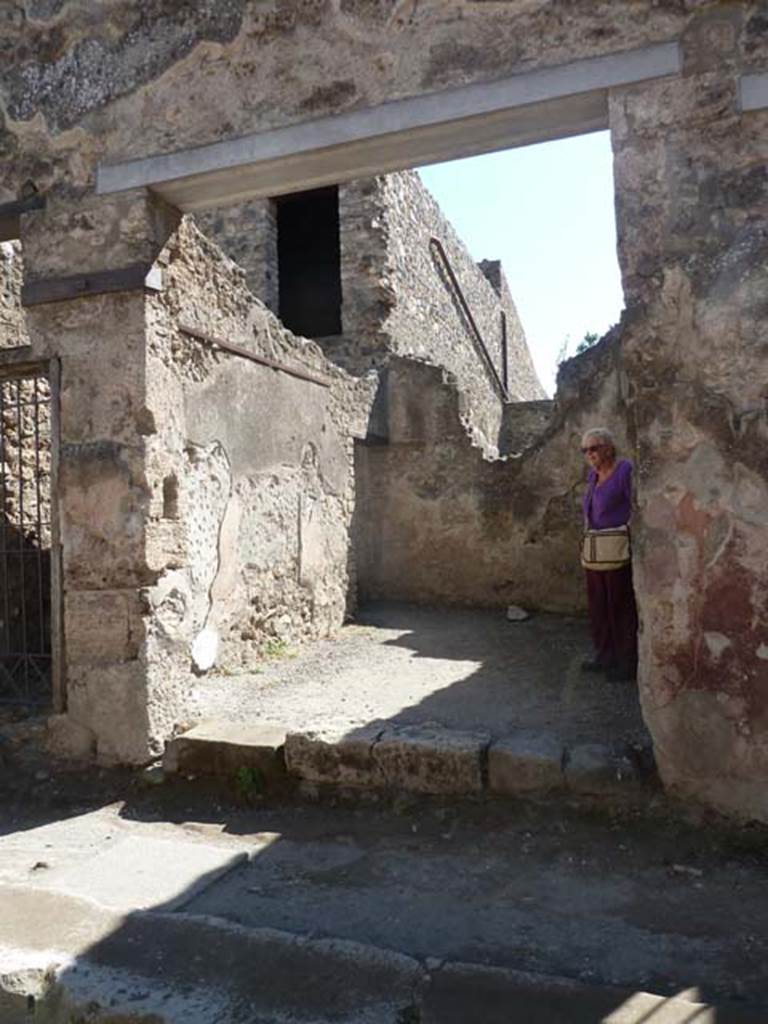 I.10.6 Pompeii. December 2007. Doorway in east wall of workshop and doorway on floor above.