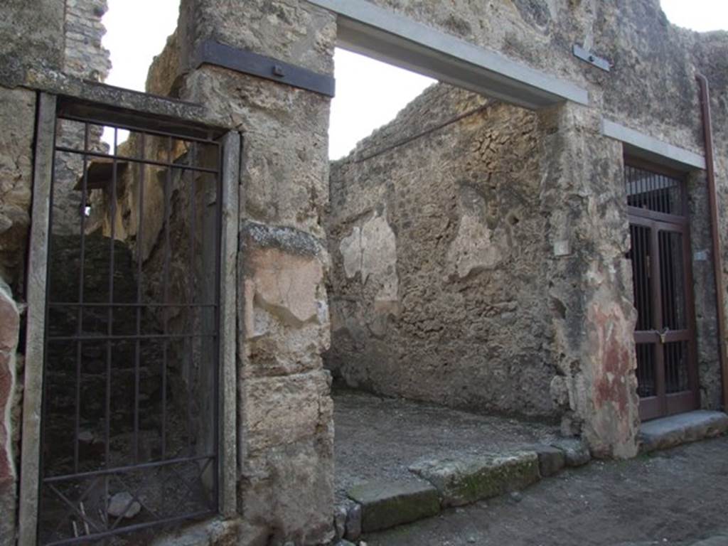 I.10.6 Pompeii. December 2007. Niche in west wall in small room to east of workshop. According to Boyce, this arched nice was painted red on the inside. A thick ledge was indicated in the stucco below it, although the floor does not project. Not. Scavi, 1934, 276f. See Boyce G. K., 1937. Corpus of the Lararia of Pompeii. Rome: MAAR 14. (p.29, no.55)