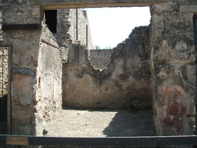 I.10.6 Pompeii. Workshop. December 2007. Small room to east of workshop. Hearth or oven in west wall.