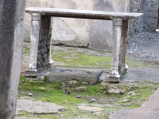 I.10.7 Pompeii. March 2009. Room 4, marble table in atrium. Looking south.