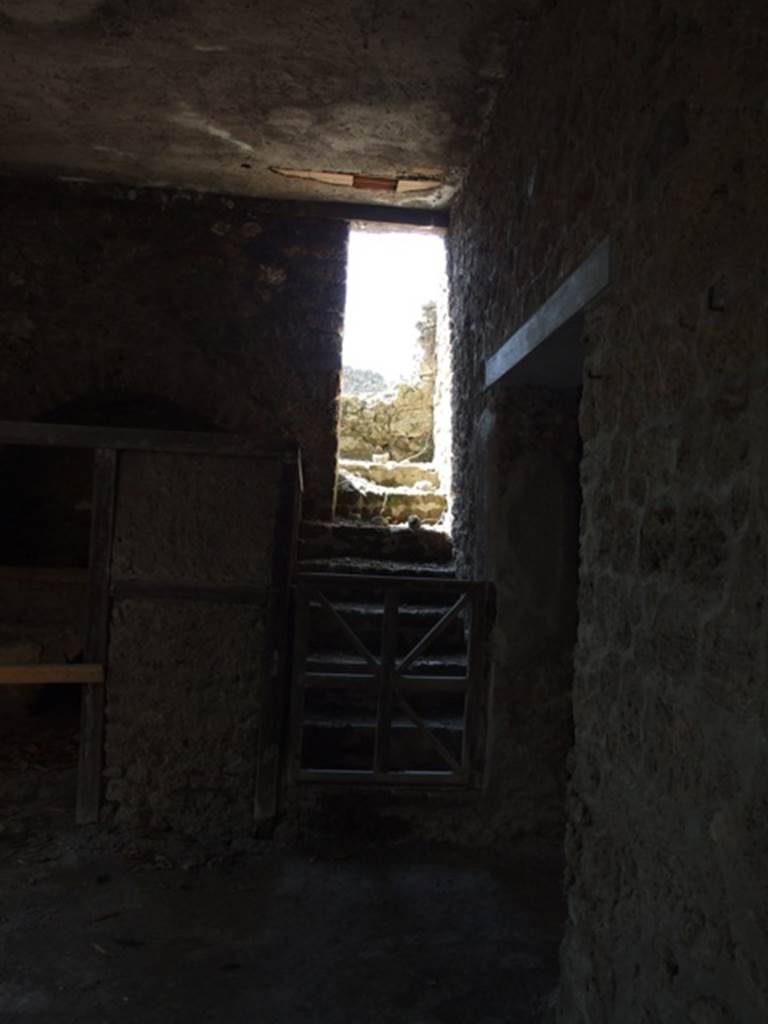 I.10.7 Pompeii. March 2009. Room 11, kitchen. Looking west towards stairs to upper floor.
According to NdS � 
this brick stairs led up by 7 steps to another set of 7 steps which led to a terrace, and perhaps to the upper rooms.
See Notizie degli Scavi, 1934, (p.280.)


 
