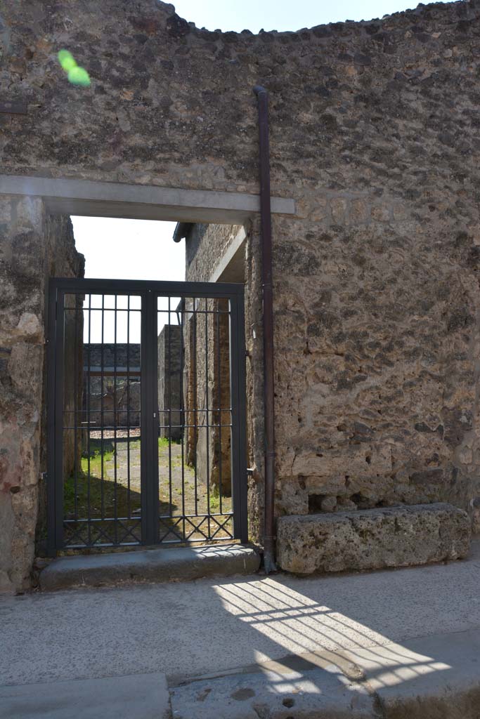 I.10.7 Pompeii. April 2017. Entrance doorway. Photo courtesy Adrian Hielscher.
According to NdS �
�Of all the large and small houses, of this insula, with the exception of the Casa del Menandro, this dwelling although modest, was the one that provided the most finds. A great deal of material was found in every room of the house, in which the number of objects, having a character of practical usefulness and intrinsic value, was remarkable.�
See Notizie degli Scavi, 1934,  (p.292)
For details of finds and their locations, 
See Notizie degli Scavi, 1934,  (p.292-308)
For details of �finds� from this house,
See Allison, P.M. (2006). The Insula of the Menander at Pompeii: Vol. III The finds, Clarendon Press, Oxford, (p.158-213, & p.337-349, & Suppl. p.275-283).
See Online Companion with details and photographs of finds from I.10.7.
