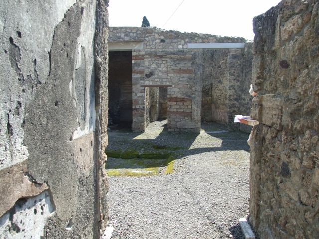I.10.8 Pompeii. December 2004. Doorway to room 3 on east side of atrium.