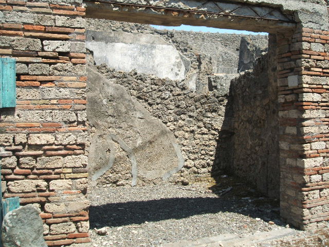 I.10.9 Pompeii. March 2009. Structure on west wall of insula to the south of I.10.9. Looking north along the Vicolo del Citarista.