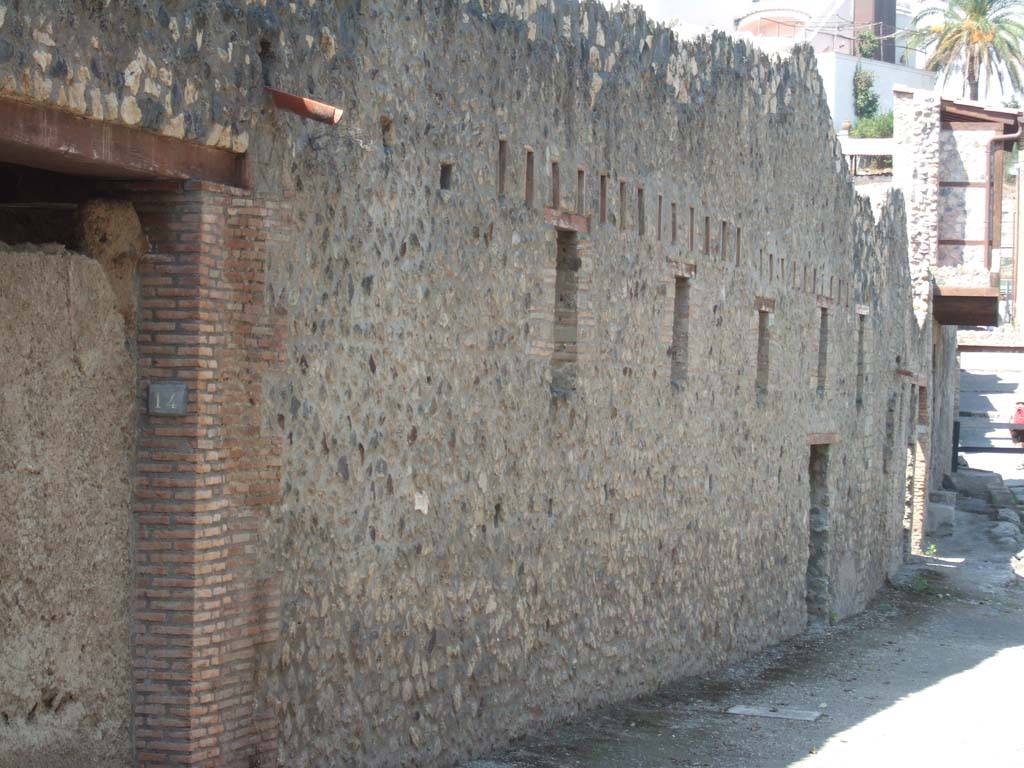 I.10.14 Pompeii. May 2006. East side of stable, with two-wheeled cart and blocked doorway.