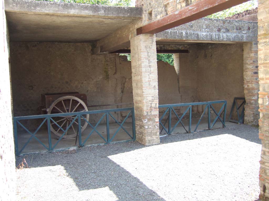 I.10.14 Pompeii. March 2009. Looking north-east across stable.