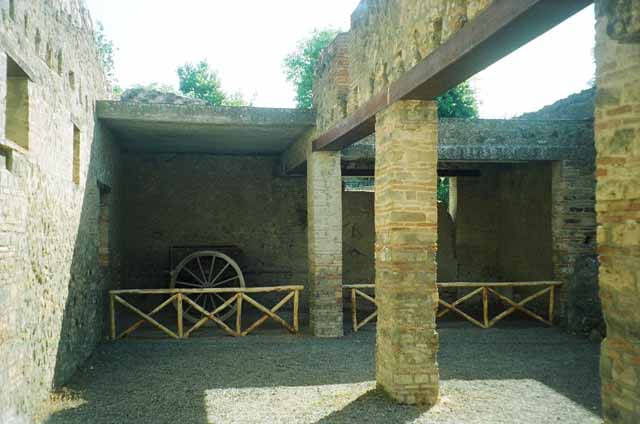 I.10.14 Pompeii. May 2006. Doorway in west end of north wall of stable.
