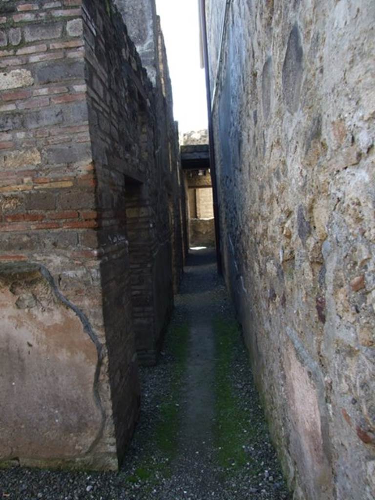 I.10.15 Pompeii. March 2009. Remains of columns in floor of corridor between peristyle and servants quarters.