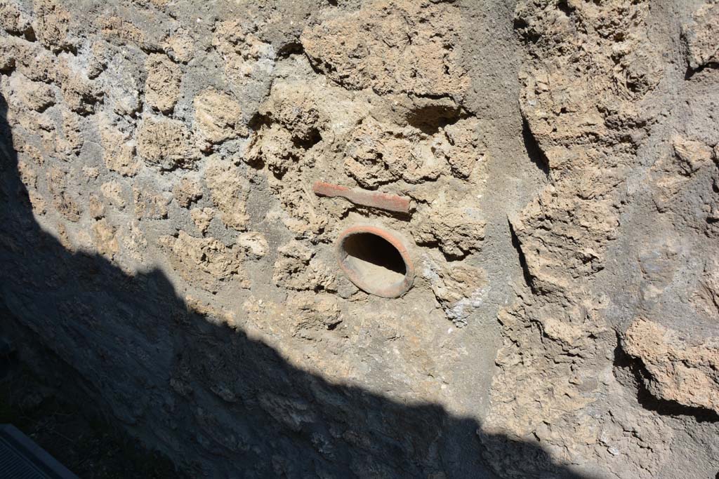 I.10.16 Pompeii.  March 2009.  Atrium.  Terracotta Compluvium.  Decorated relief on side which has satyr’s head missing.