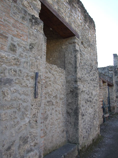 I.11.6 Pompeii. March 2009. West wall of entrance fauces, looking north from interior.