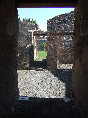 I.11.12 Pompeii. September 2005. Painted wall decoration with window.