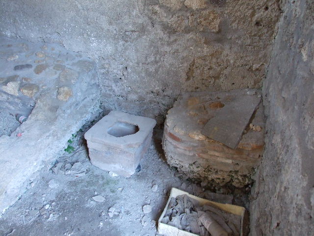 I.11.13 Pompeii. December 2006. Arched niche lararium on east wall.
The niche and surrounding wall panel were plastered and painted white.
See Giacobello, F., 2008. Larari Pompeiani: Iconografia e culto dei Lari in ambito domestico.  Milano: LED Edizioni. (p.258)

