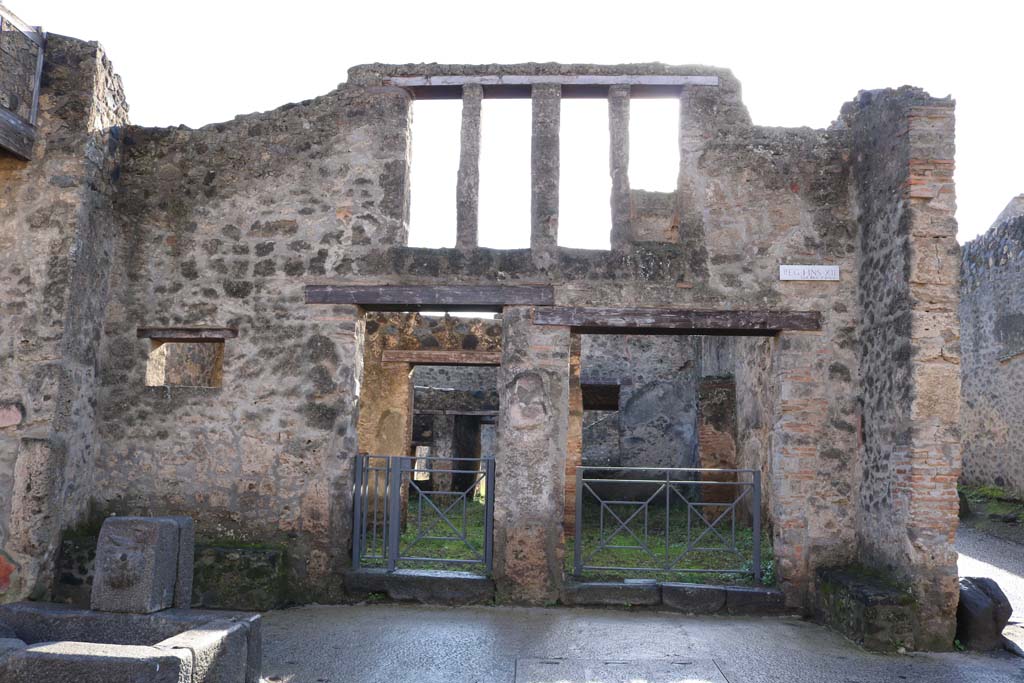 I.12.2 and I.12.1 Pompeii. December 2018. Looking south to entrances on Via dell�Abbondanza. Photo courtesy of Aude Durand.