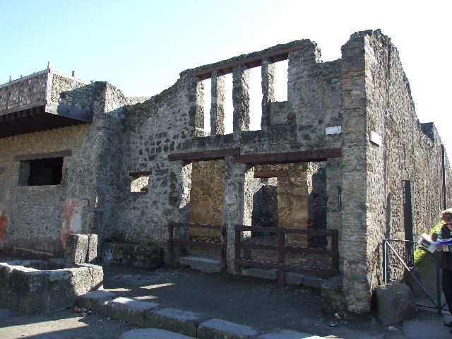 I.12.2 and I.12.1 Pompeii. March 2009. Room 3, room with mills. Looking south-east.