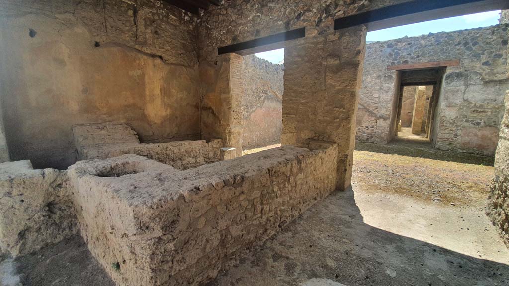 I.12.5 Pompeii. July 2021. 
Looking south-east towards east side of bar-room and south across atrium to corridor leading to garden at rear.
Foto Annette Haug, ERC Grant 681269 DÉCOR.
