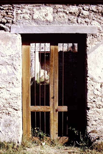 I.12.8 Pompeii. March 2009. Room 5. Looking north to door to south portico of peristyle, with door to room 6, on west (left).