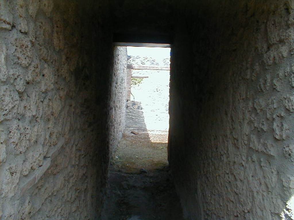 I.12.9 Pompeii. House. December 2007. Looking north on east side of Tablinum towards the kitchen.