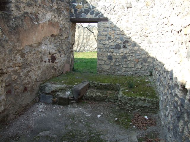 I.12.9 Pompeii. House. December 2007. Niches in South east corner of atrium.