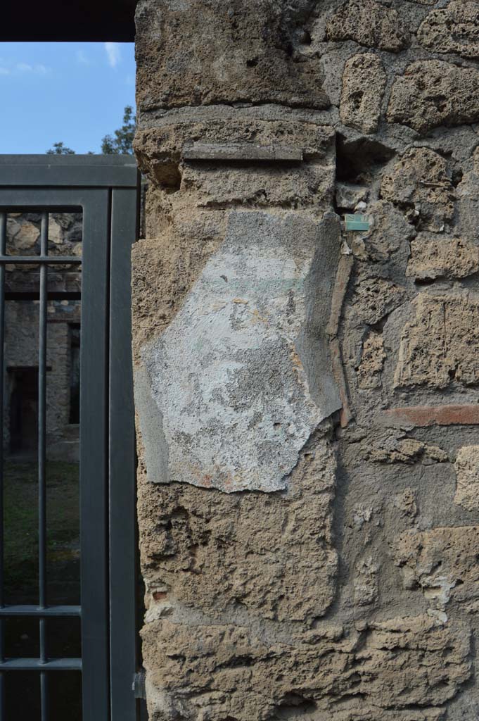 I.12.11 Pompeii. October 2018.
Pilaster on east of entrance doorway, site of wall painting of Hercules.
Foto Taylor Lauritsen, ERC Grant 681269 D�COR.
