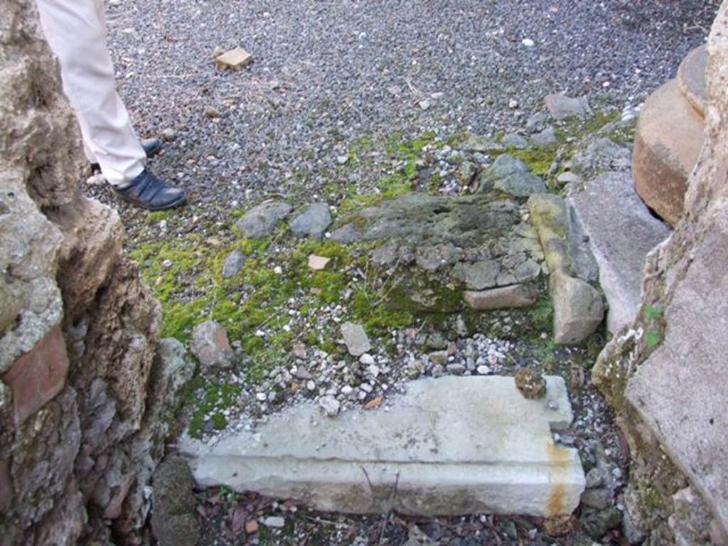 I.12.15 Pompeii. March 2009. Steps to outside Triclinium, at east end of corridor.