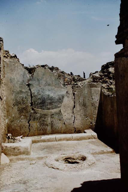 I.12.16 Pompeii. May 2010. Room 3, looking through doorway towards east wall.
