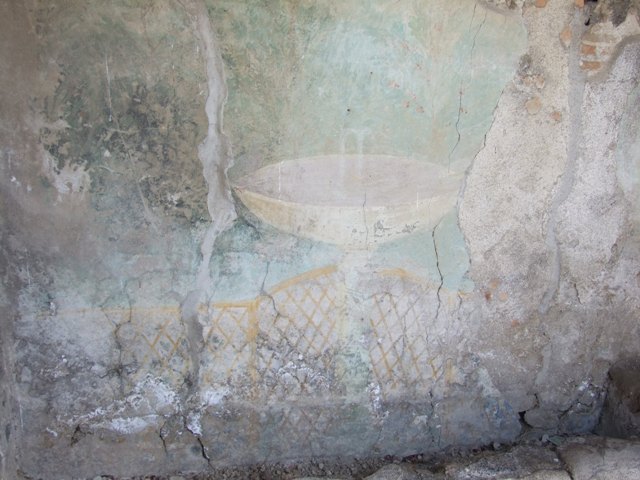 I.12.16 Pompeii. March 2009. Room 4, east wall with detail of wooden trellis fencing on garden painting.