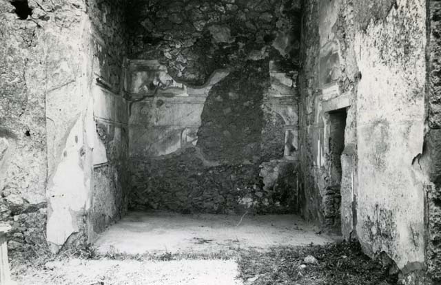 I.13.2 Pompeii. May 2010. Detail of lararium on east wall.