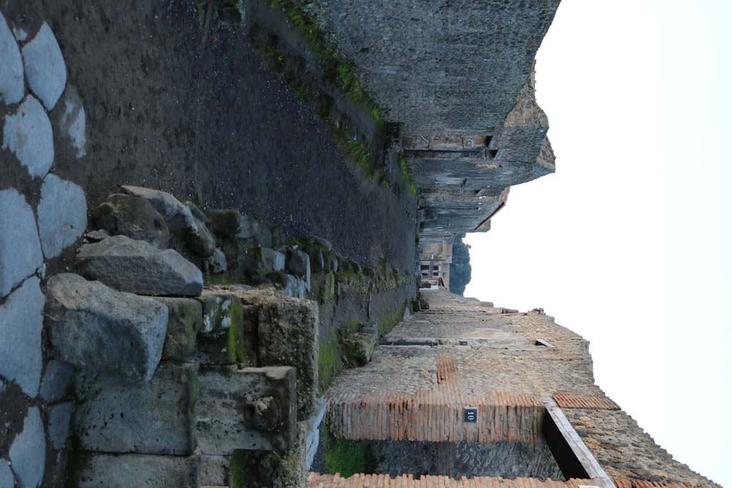 I.13.10 Pompeii. December 2005. Corner of vicolo at I.13.10, looking north-east from Via di Castricio.