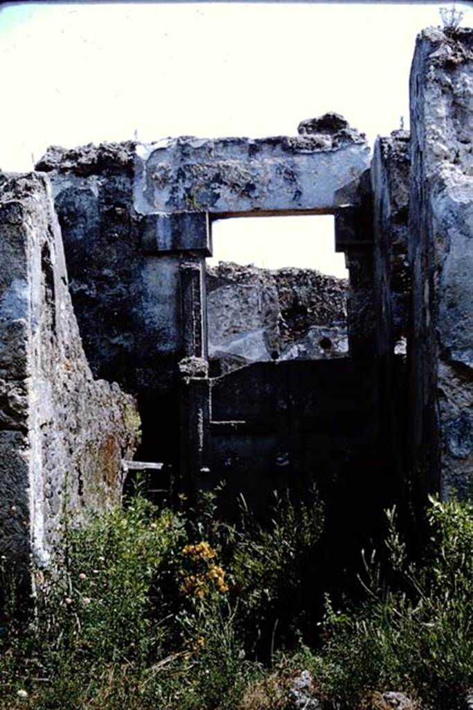 I.13.12 Pompeii. 1964. Looking south to plaster-cast of inside entrance door. Photo by Stanley A. Jashemski.
Source: The Wilhelmina and Stanley A. Jashemski archive in the University of Maryland Library, Special Collections (See collection page) and made available under the Creative Commons Attribution-Non Commercial License v.4. See Licence and use details.
J64f1645