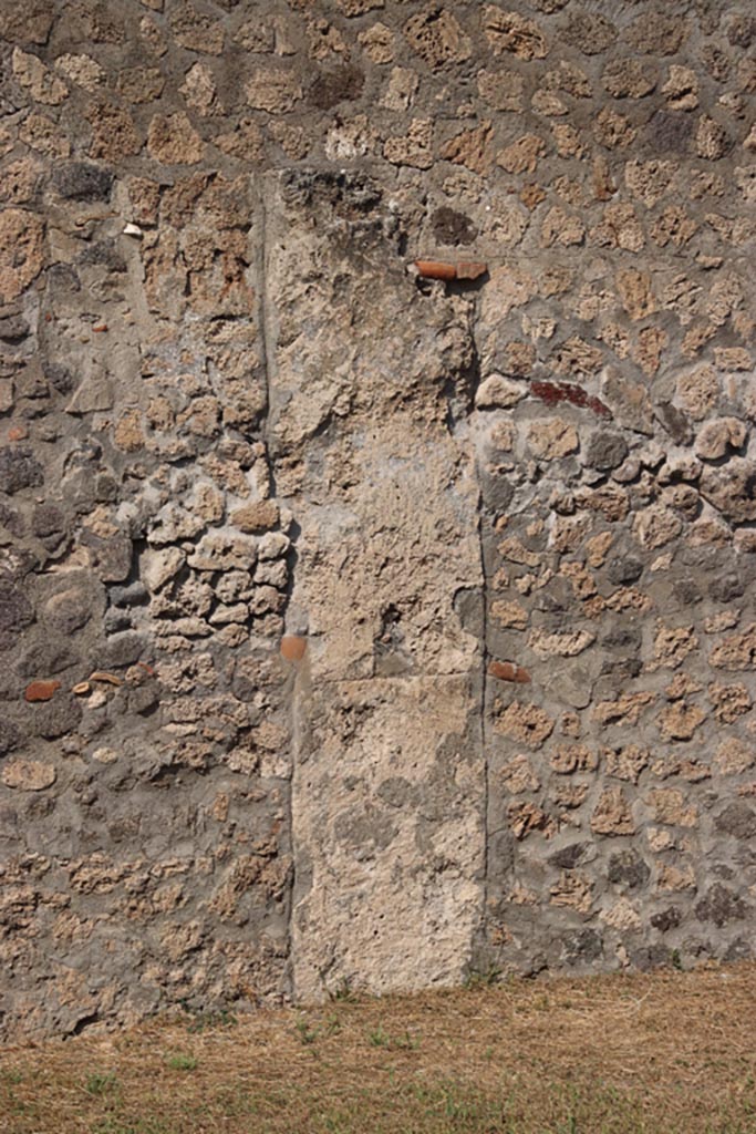 I.13.12 Pompeii. October 2023.
North wall of atrium, with detail from east side of doorway/window to yard.
Photo courtesy of Klaus Heese.