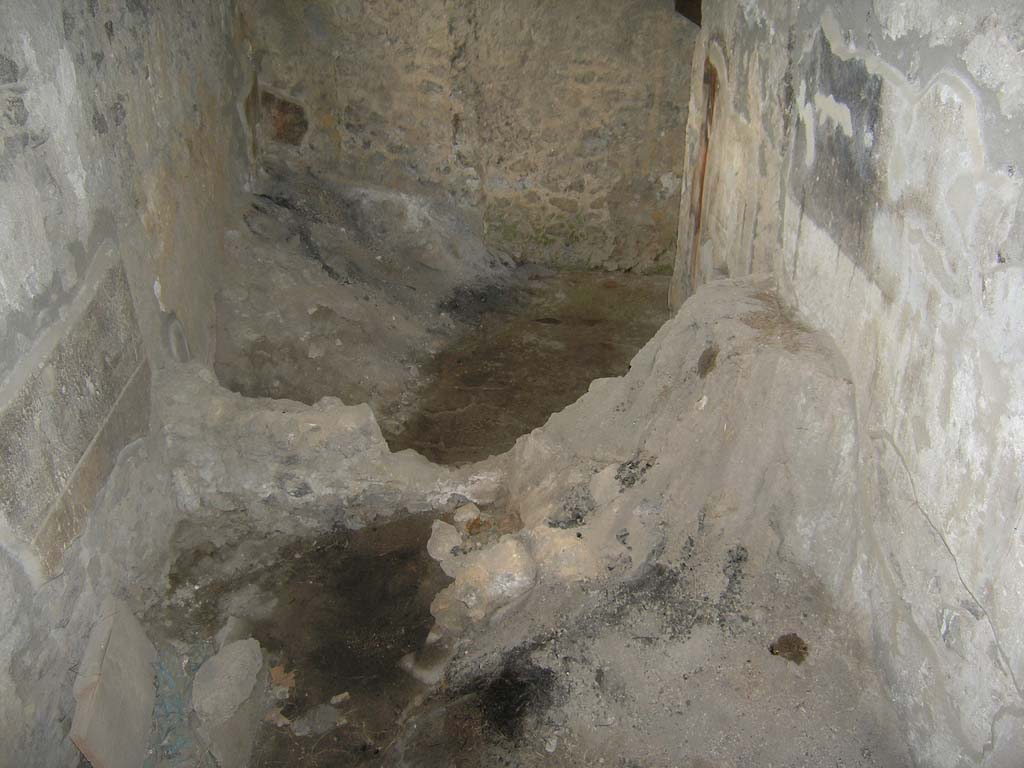I.14.2 Pompeii. July 2008. Room I, cubiculum, looking south from room J. Photo courtesy of Guilhem Chapelin. 
At the far-left end is a mound of carbonized plants preserved in cubiculum I, south-east corner.
Voir Chapitre 2 : L�atelier de fabrication de nattes de la via di Nocera (I 14, 2) in Magali Cullin-Mingaud, 2010. La vannerie dans l'Antiquit� romaine: Collection du Centre Jean B�rard 35. Paris. Centre Jean Berard, p. 129-171, fig. 196.
https://books.openedition.org/pcjb/706  
