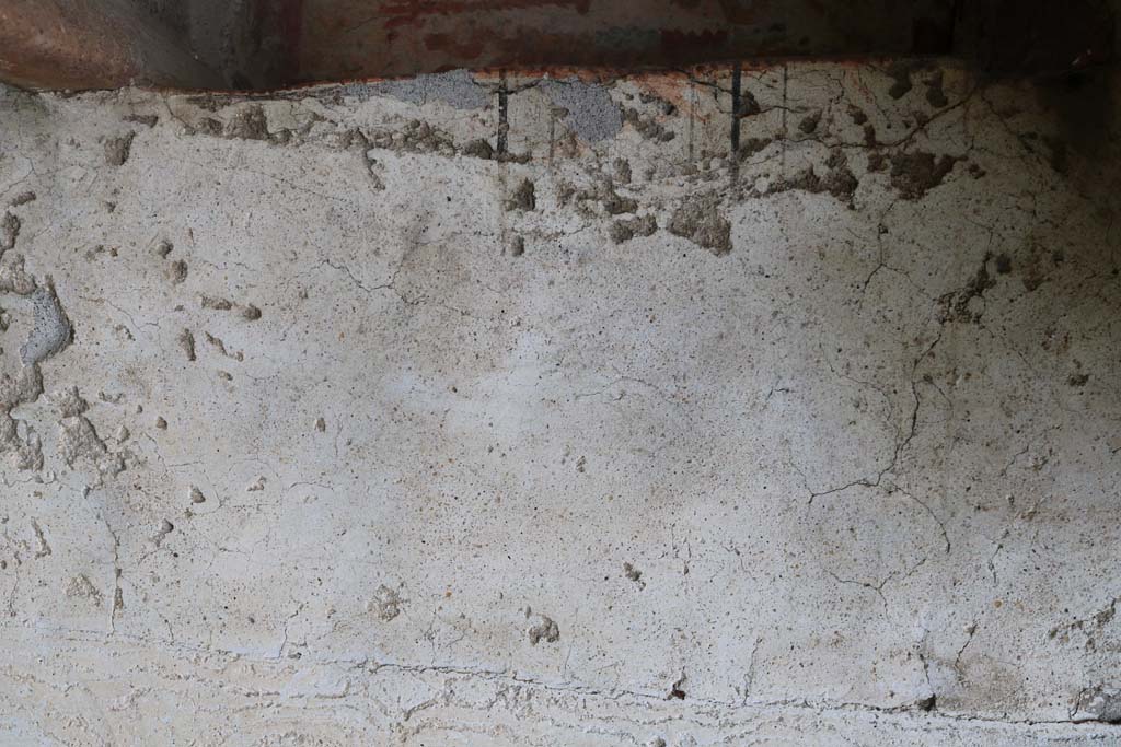 I.14.7 Pompeii. December 2006. Graffiti between I.14.7 and I.14.8. 
According to Varone and Stefani, this is CIL IV 9919. See Varone, A. and Stefani, G., 2009. Titulorum Pictorum Pompeianorum, Rome: L’erma di Bretschneider, (p.164 & 166)
According to Epigraphik-Datenbank Clauss/Slaby (See www.manfredclauss.de), this reads as –
Cn(aeum)  Helvium 
Sabinum  aed(ilum)  d(ignum)  r(ei)  p(ublicae) 
Porcellus  cum  suis  rog(at)       [CIL IV 9919]
According to Cooley, CIL IV 9919 translates as –  Porcellus with his household asks for C N Helvius Sabinus as aedile, worthy of public office.    See Cooley, A. and M.G.L., 2004. Pompeii : A Sourcebook. London : Routledge. (p.122)
