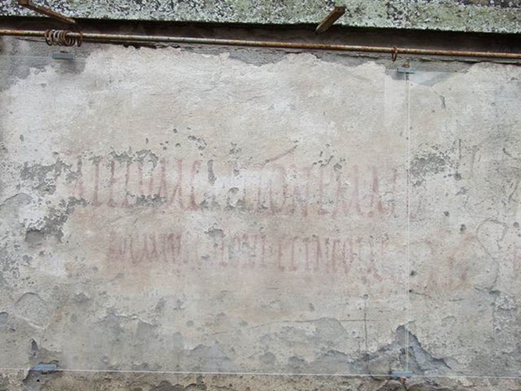 Pompeii.  December 2006. Graffiti between I.14.7 and I.14.8
According to Varone and Stefani, this is CIL IV 9918.
See Varone, A. and Stefani, G., 2009. Titulorum Pictorum Pompeianorum, Rome: L�erma di Bretschneider, (p.164-165)
 
According to Epigraphik-Datenbank Clauss/Slaby (See www.manfredclauss.de), this reads as �

C(aium)  Ateium  Capitonem  aed(ilem) 
rogamus  coloni  et  incolae       [CIL IV 9918a]

According to Cooley this translates as 
We the town�s citizens and resident aliens ask for Gaius Ateius Capito as aedile.
See Cooley, A. and M.G.L., 2004. Pompeii : A Sourcebook. London : Routledge, p. 117, F26.

Just under this is another inscription
Suc(c)ubus v(ale)       [CIL IV 9918b]
